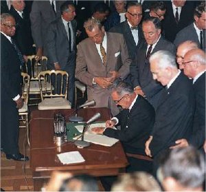 Johnson signing Civil Rights Act